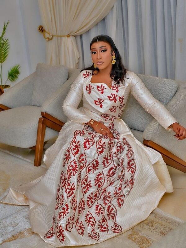 c7681bcc3c963c3c817870557bb181fb~2 African Dress with Sleeves – Custom-Made Embroidered Bazin Outfit