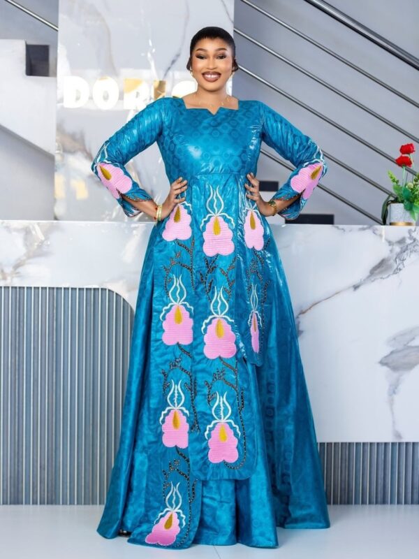 Bazin for Eid in teal Getzner with floral embroidery design