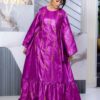 Bazin wedding guest dress with flared sleeves and flowing maxi design