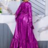 Bazin wedding guest dress with flared sleeves and flowing maxi design