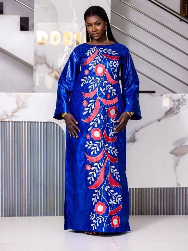 Elegant bazin dress for wedding guest in blue Getzner with floral embroidery