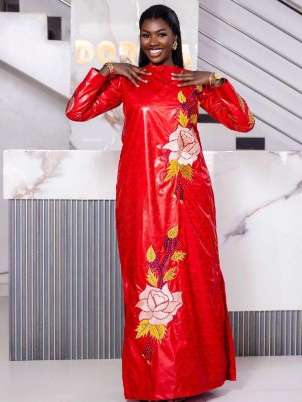 Modest bazin dress for Muslim women in red Getzner with floral embroidery