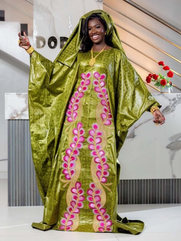 Green dress showing minimal accessories for bazins