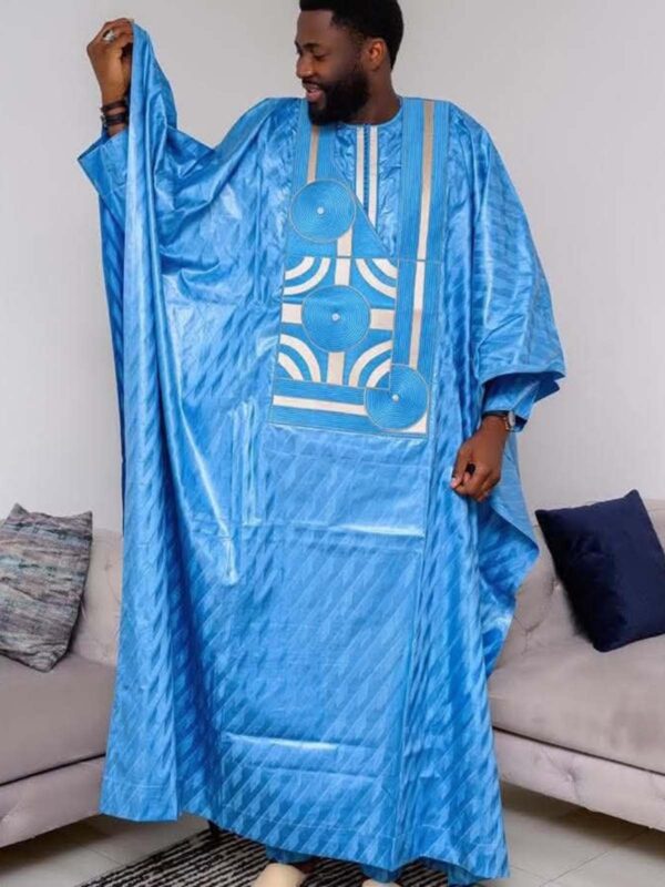 Traditional African men outfit blue bazin set with detailed embroidered chest panel
